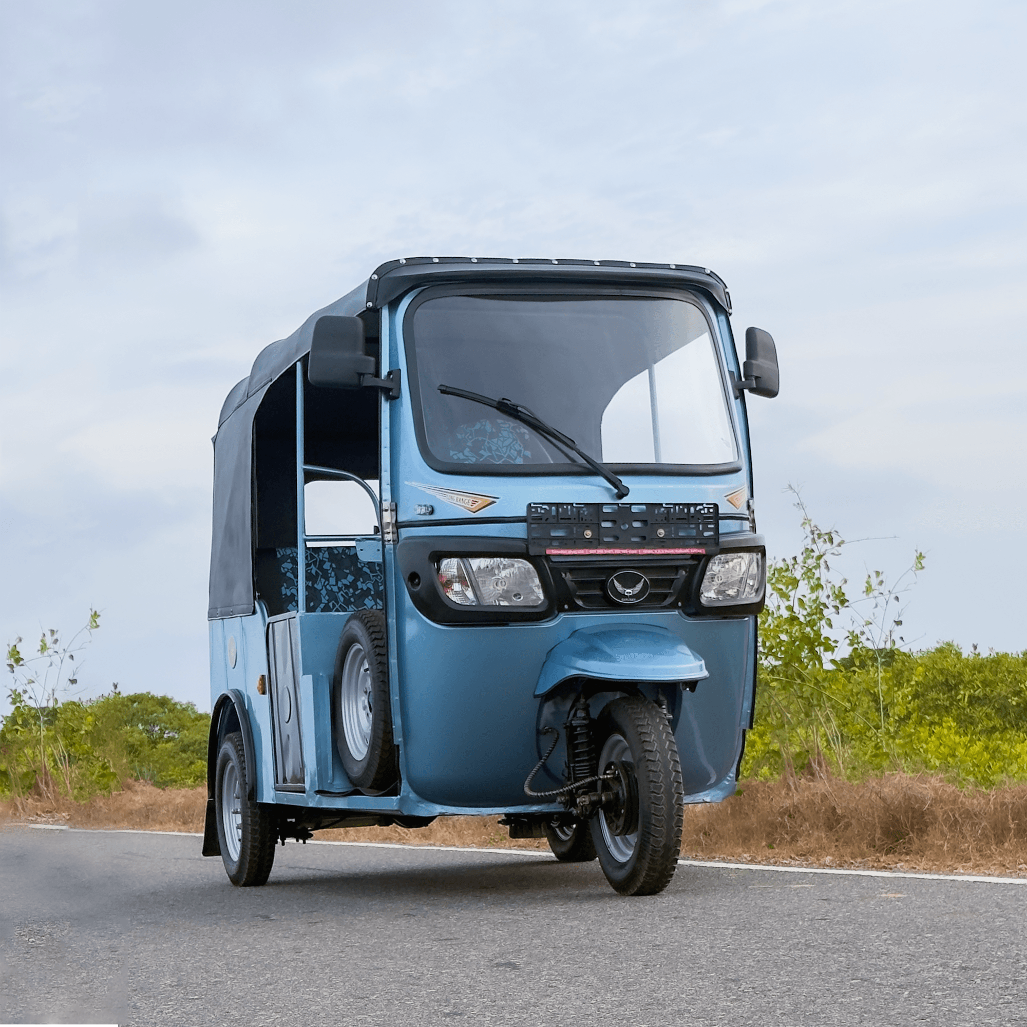 Neptune three-wheeler in Neptune Blue — front view